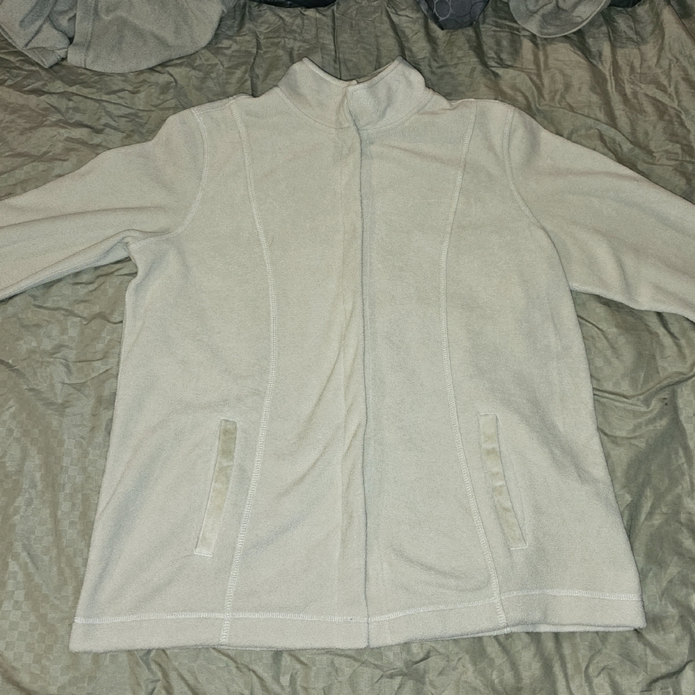 Large female off white polyester jacket with snaps